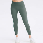 Butt lifting workout leggings for women in green, high-waisted with tummy control and seamless design for ultimate comfort.