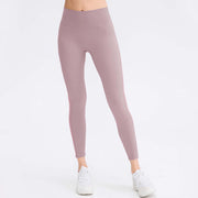 Butt lifting workout leggings for women in soft mauve, featuring a high waist and seamless design for ultimate comfort.
