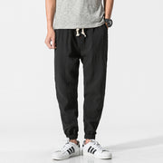 Men's Cotton Linen Harem Pants in Black – Front View