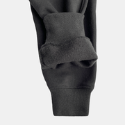 Close-up of the cuff of Men's Future Summit Fleece Trouser showcasing soft, durable cotton fleece interior.