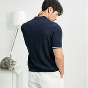 Close-up of lapel zipper on men's summer polo shirt