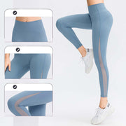 Butt lifting workout leggings for women in blue, featuring high-waisted design and mesh panels for added style.