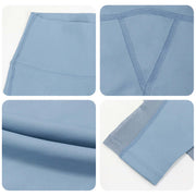 Close-up of blue butt lifting workout leggings featuring high-waisted design and seamless stitching details.