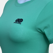 Close-up of Classic Foil Badge T-Shirt in mint green featuring soft cotton fabric and stylish logo design.