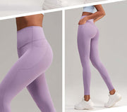 High waist lavender yoga pants for women, featuring a comfortable and flattering fit, perfect for workouts and casual wear.