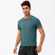 Men's loose fit quick-dry running t-shirt in teal, perfect for workouts and sports activities.