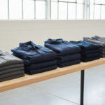 Stacked polo shirts, jackets and hoodies for bulk custom company workwear